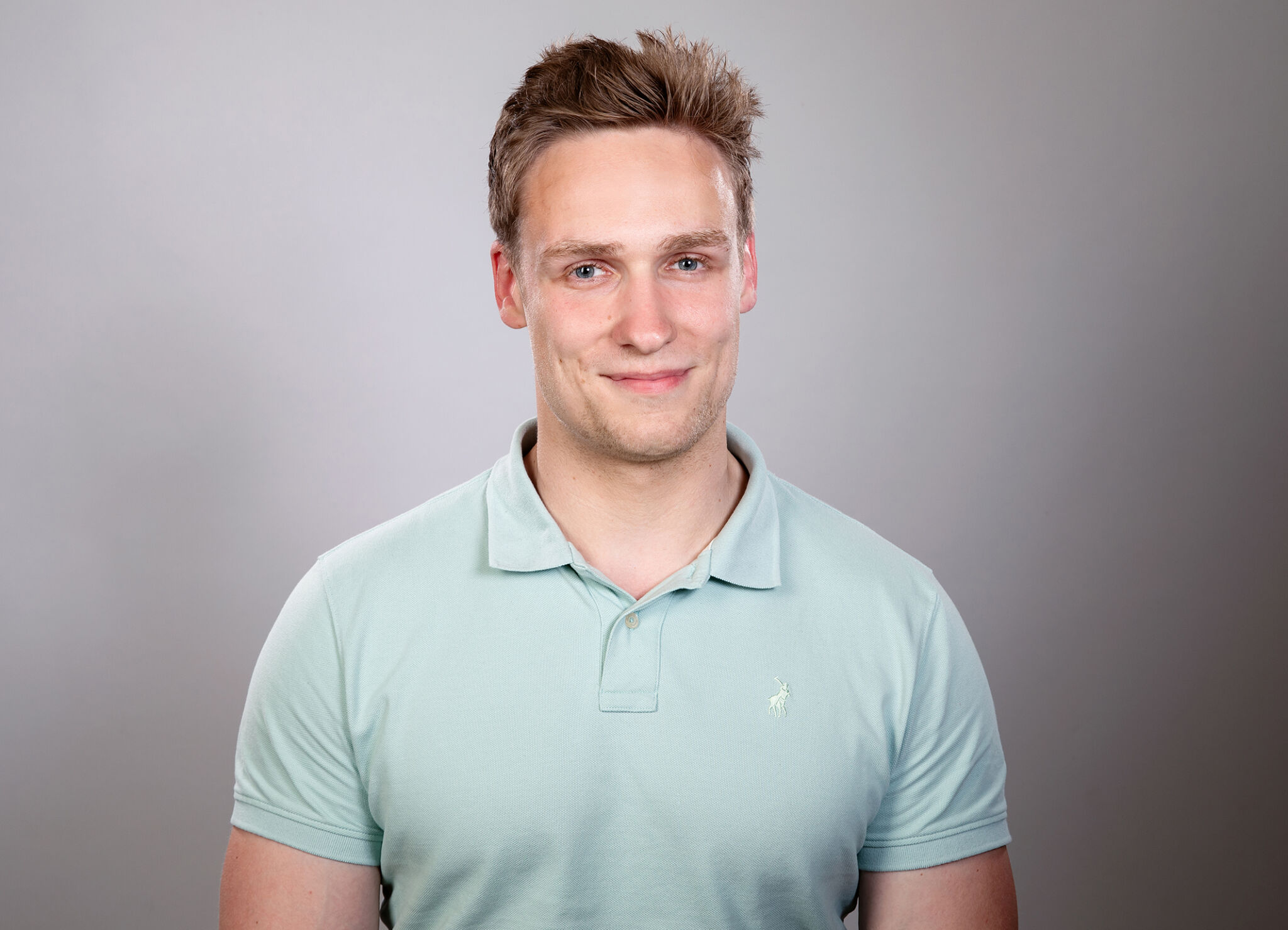 Porträtfoto von Miguel Schmock von Ohr